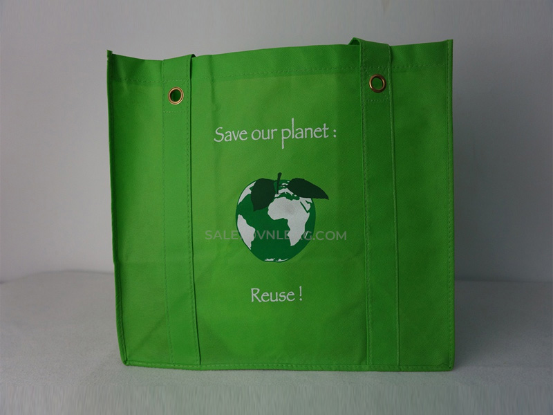 non woven with circle handles all along main face X sewing
